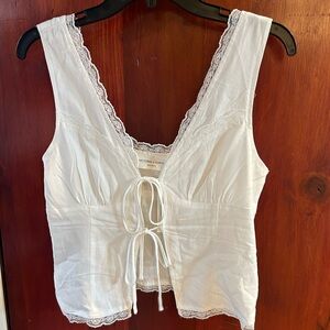 Victoria and Sophia lace front tie tank.